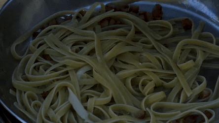 Drizzling Yellow Sauce On Noodles GIF