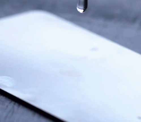 Drop Of Water Falling On Tablet GIF