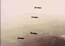 Dropping Atomic Bombs On Mountains GIF