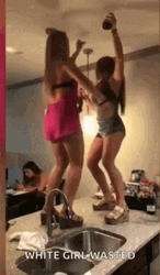 Drunk Girl Falling Off The Counter Top GIF