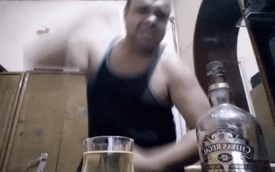 Drunk Guy Angrily Punches Table GIF