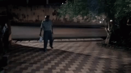 Drunk Guy Looking At Clock GIF