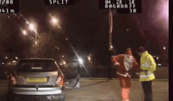 Drunk Santa Questioned By Police GIF