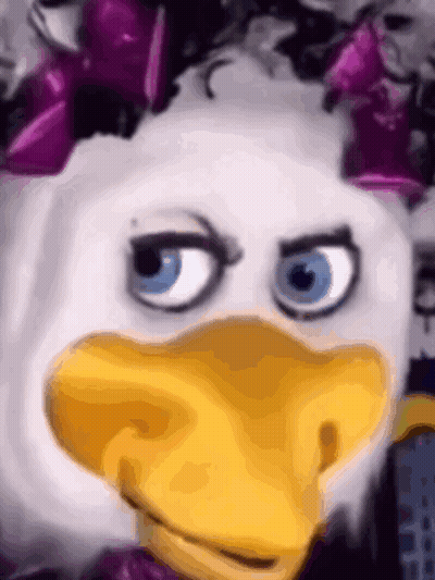Duck Mask With Purple Bow GIF