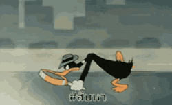Duffy Duck Searching On The Ground GIF