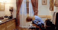 Dumb And Dumber Bathroom Raising Feet GIF