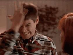 Dumb Jim Carrey Head Punch GIF