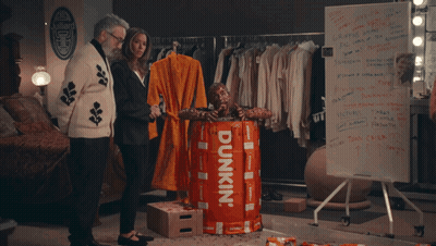 Dunkin' Barrel With Man Statue GIF
