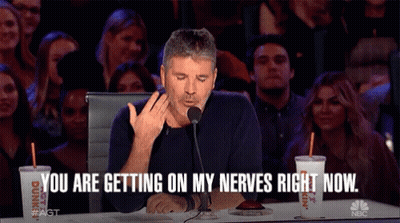 Dunkin' Donuts Cup And Man Speaking Into Microphone GIF