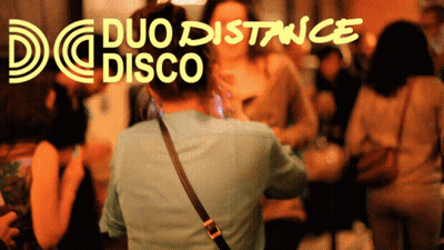 Duo Distance Disco Poster Woman Taking Picture Of Crowd GIF