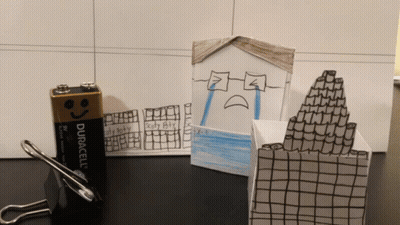 Duracell Battery Next To Sad House Drawing GIF