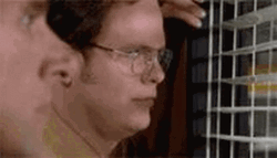Dwight Schrute The Office Smirk GIF
