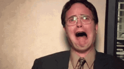 Dwight Schrute The Office Tongue Sticking Out GIF