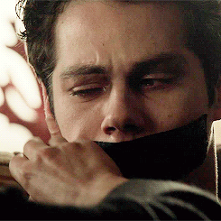 Dylan O'Brien Removing Tape Void Stiles GIF