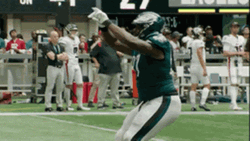 Eagles Players Kicking GIF