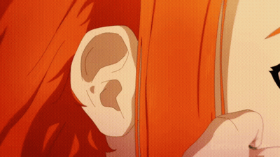 Ear Close-Up With Brown Text GIF