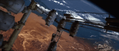 Earth From Space With Foreground Buildings GIF