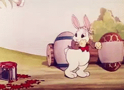 Easter Bunny Printing Eggs With Hear Butt GIF