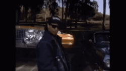 Eazy E Rapping On Bouncing Cars Music Video GIF