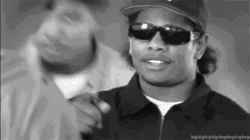Eazy E Wearing Dark Shades Pointing GIF