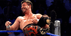 Eddie Guerrero Chilling On Top Of Ring GIF