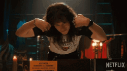 Eddie Munson Welcomes Everyone GIF