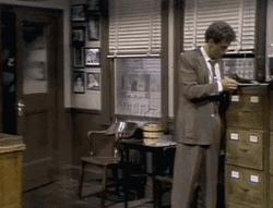 Eddie Murphy Entering Office In Gumby Suit GIF