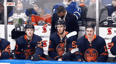 Edmonton Oilers Hockey Players Sitting GIF