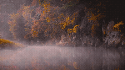 Edna 'S Art Shows A Foggy Lake Surrounded By Trees And Rocks GIF