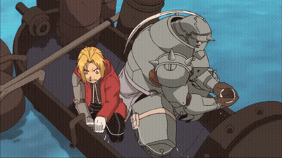 Edward And Alphonso Standing On A Boat GIF
