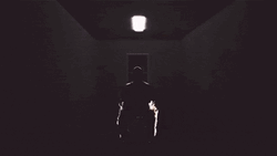 Eerie Silhouette Of A Man On Fire  GIF