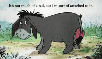 Eeyore From Winnie The Pooh With Red Bow On Tail GIF