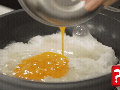 Egg Being Poured Into Pan GIF