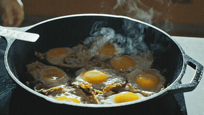 Eggs Cooking In Lodge Skillet GIF