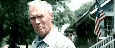Elderly Man By House With American Flag GIF