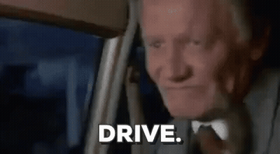 Elderly Man In Suit Sitting In Car GIF