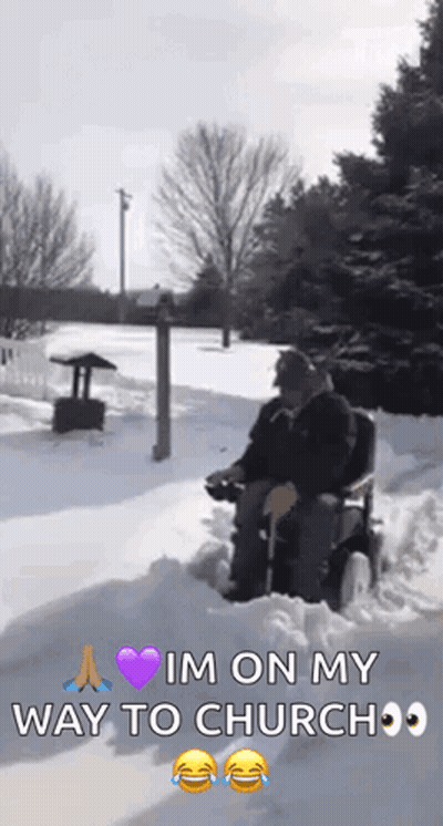 Elderly Man In Wheelchair Driving Through Snow GIF