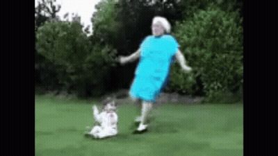 Elderly Woman Dancing With Girl In Field GIF