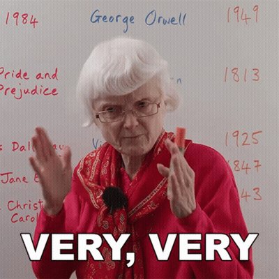 Elderly Woman Holding Carrot GIF