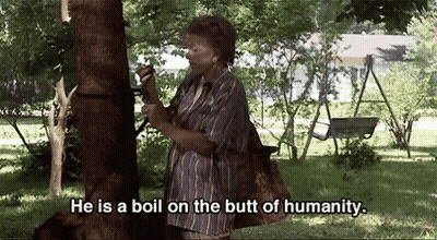 Elderly Woman Holding Hammer Saying He Is A Boil On The Butt Of Humanity GIF