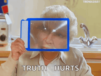 Elderly Woman Holding Magnifying Glass Truth Hurts GIF