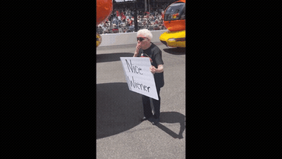 Elderly Woman Holding Nice Wiener Sign GIF