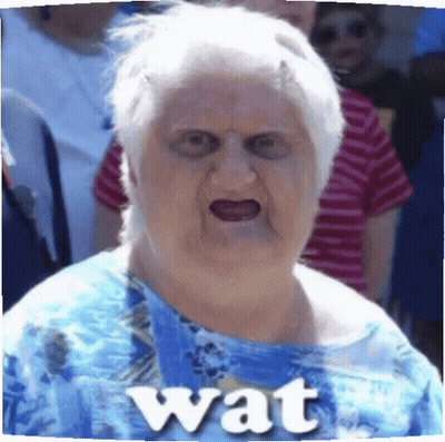 Elderly Woman In Blue Shirt With Wat On Chest GIF