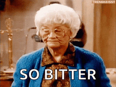 Elderly Woman In Glasses And Blue Sweater Saying So Bitter GIF