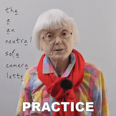 Elderly Woman In Glasses And Red Scarf At Practice Whiteboard GIF