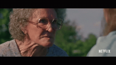 Elderly Woman In Glasses Talking To Another Woman GIF