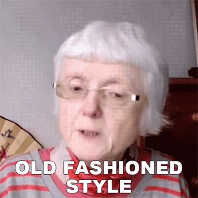 Elderly Woman In Striped Shirt Saying Old Fashioned Style GIF