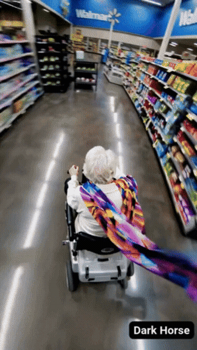 Elderly Woman In Wheelchair Walking GIF