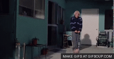 Elderly Woman Jumping In Front Of Blue Building Make GIFs At Gifsoup GIF