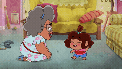 Elderly Woman Kneeling Next to Young Girl